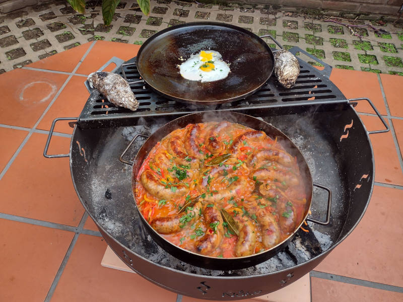 Disco de arado en fogón parrilla